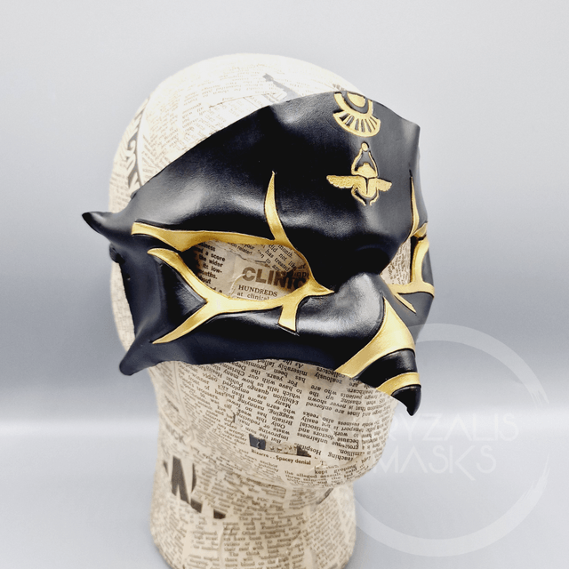 Leather Horus mask with scarab