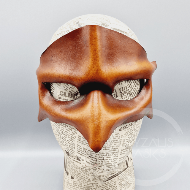Brown leather bird mask