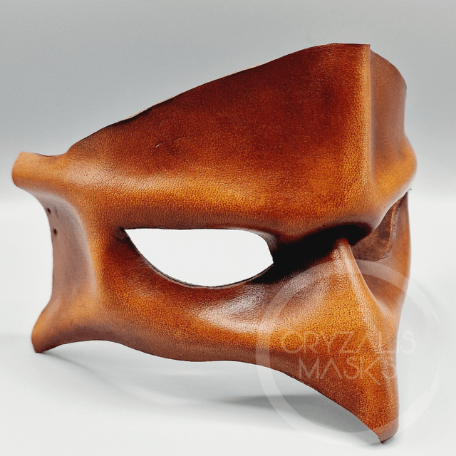 Brown leather bird mask